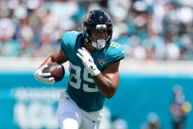 Sep 7, 2025; Jacksonville, Florida, USA; Jacksonville Jaguars tight end Brenton Strange (85) runs with the ball against the Carolina Panthers in the first quarter at EverBank Stadium. Mandatory Credit: Nathan Ray Seebeck-Imagn Images