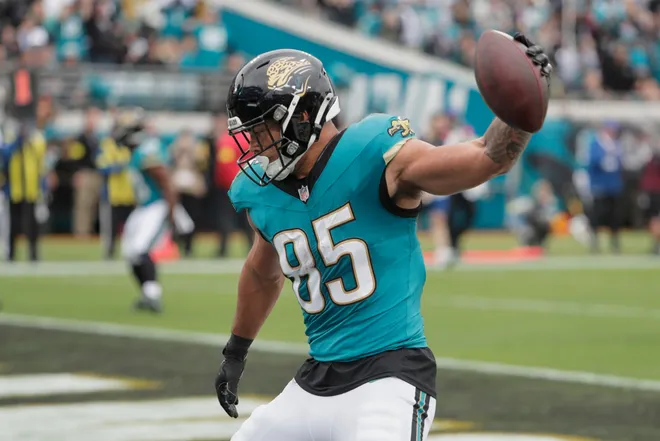 Jan 4, 2026; Jacksonville, Florida, USA; Jacksonville Jaguars tight end Brenton Strange (85) celebrates after catching a seven-yard pass for a touchdown thrown by quarterback Trevor Lawrence (not pictured) against the Tennessee Titans during the second quarter at EverBank Stadium.at EverBank Stadium. Mandatory Credit: Travis Register-Imagn Images
