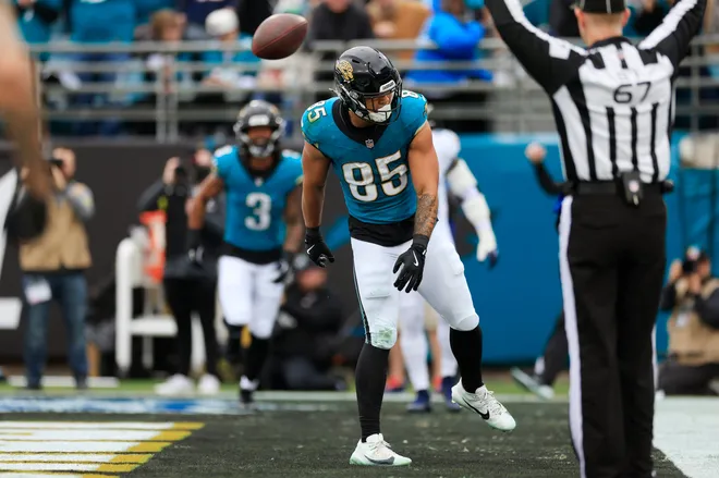Jacksonville Jaguars tight end Brenton Strange (85) spikes the ball after a touchdown score during the second quarter of an NFL football matchup at EverBank Stadium, Sunday, Jan. 4, 2026, in Jacksonville, Fla. The Jaguars defeated the Titans 41-7, capturing the AFC South title. [Corey Perrine/Florida Times-Union]