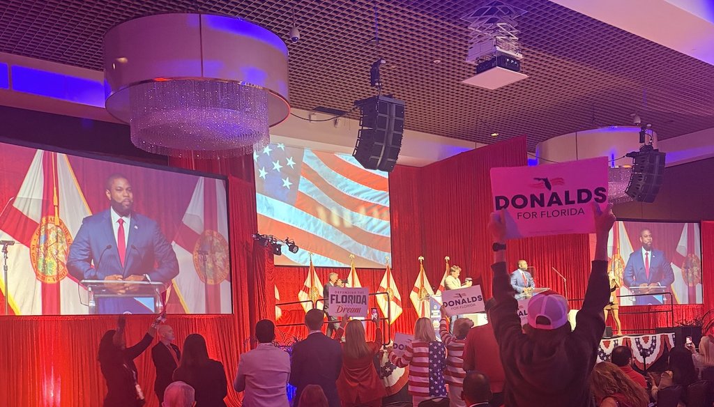 Supporters cheer as Rep. Byron Donalds, the leading GOP candidate in Florida's gubernatorial race, takes the stage at the Florida Republican Party's Sunshine State Showdown at the Seminole Hard Rock Hotel & Casino. (Samantha Putterman/PolitiFact)