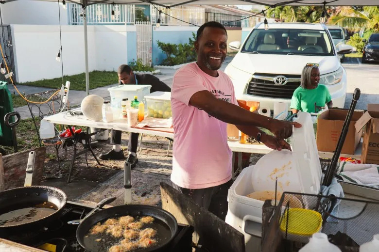 Ken Mahoney cooks up conch balls for his Miami neighbors. (Adam Mahoney/Capital B)