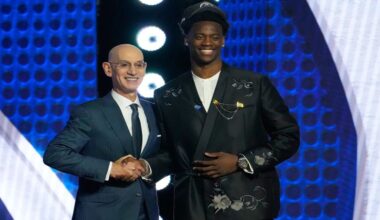 AJ Dybantsa, right, poses for a photo with NBA commissioner Adam Silver, left, after being selected by the Washington Wizards as the first pick in the first round of the NBA basketball draft, Tuesday, June 23, 2026, in New York. (AP Photo/Yuki Iwamura)