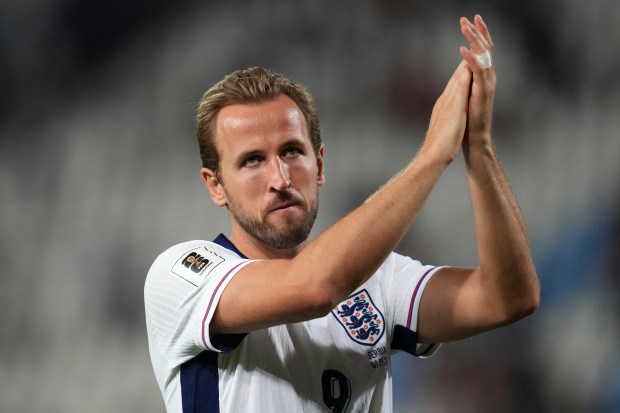 England's Harry Kane greets supporters at the end of the World Cup Group K qualifying soccer match between Serbia and England, at the Rajko Mitic Stadium in Belgrade, Serbia, Tuesday, Sept. 9, 2025. (AP Photo/Darko Vojinovic)
