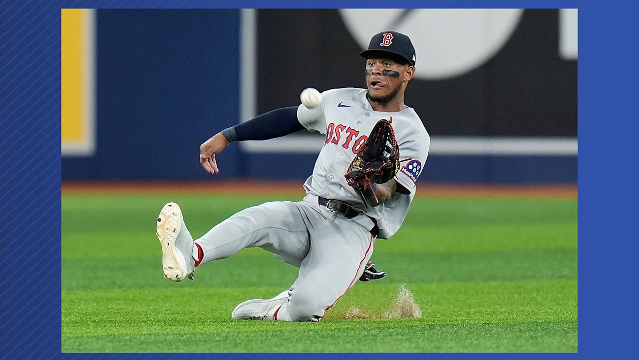 Boston Red Sox center fielder Ceddanne Rafaela makes a sliding catch on a pop out by Tampa Bay Rays' Ryan Vilade during the fifth inning of a baseball game Monday, June 8, 2026, in St. Petersburg, Fla. (AP Photo/Chris O'Meara)