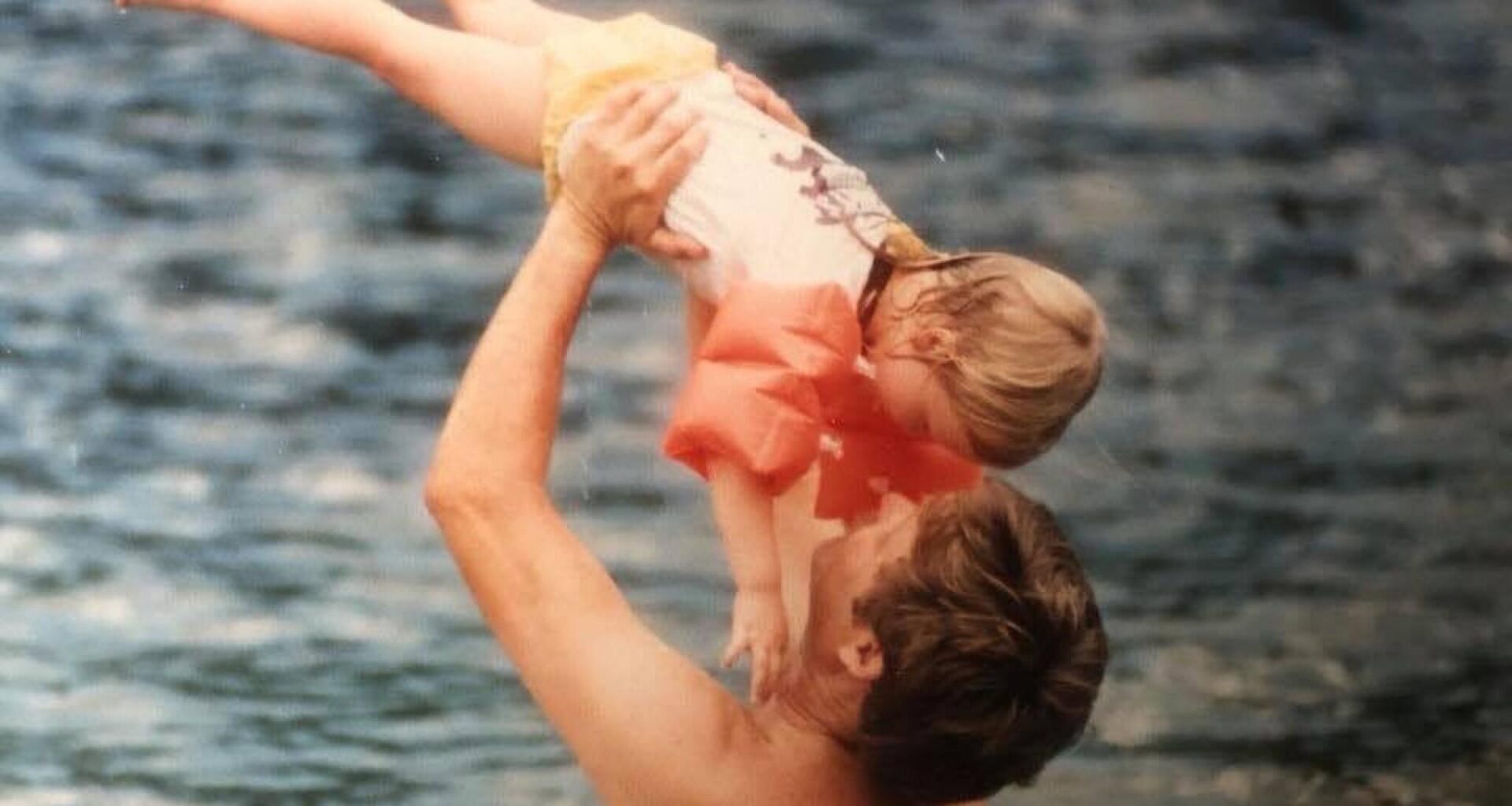 The author as a child with her father, swimming at Blue Spring State Park in Central Florida, circa 1990. (Courtesy Asha Dore)