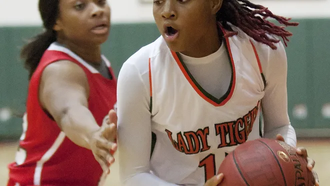 Dunbar High School’s Dekeriya Patterson is a valuable member of the Tiger’s program in 2014-15. On Saturday, the team faces a rival in Ribault at the 3rd annual Rob Moramarco Challenge.