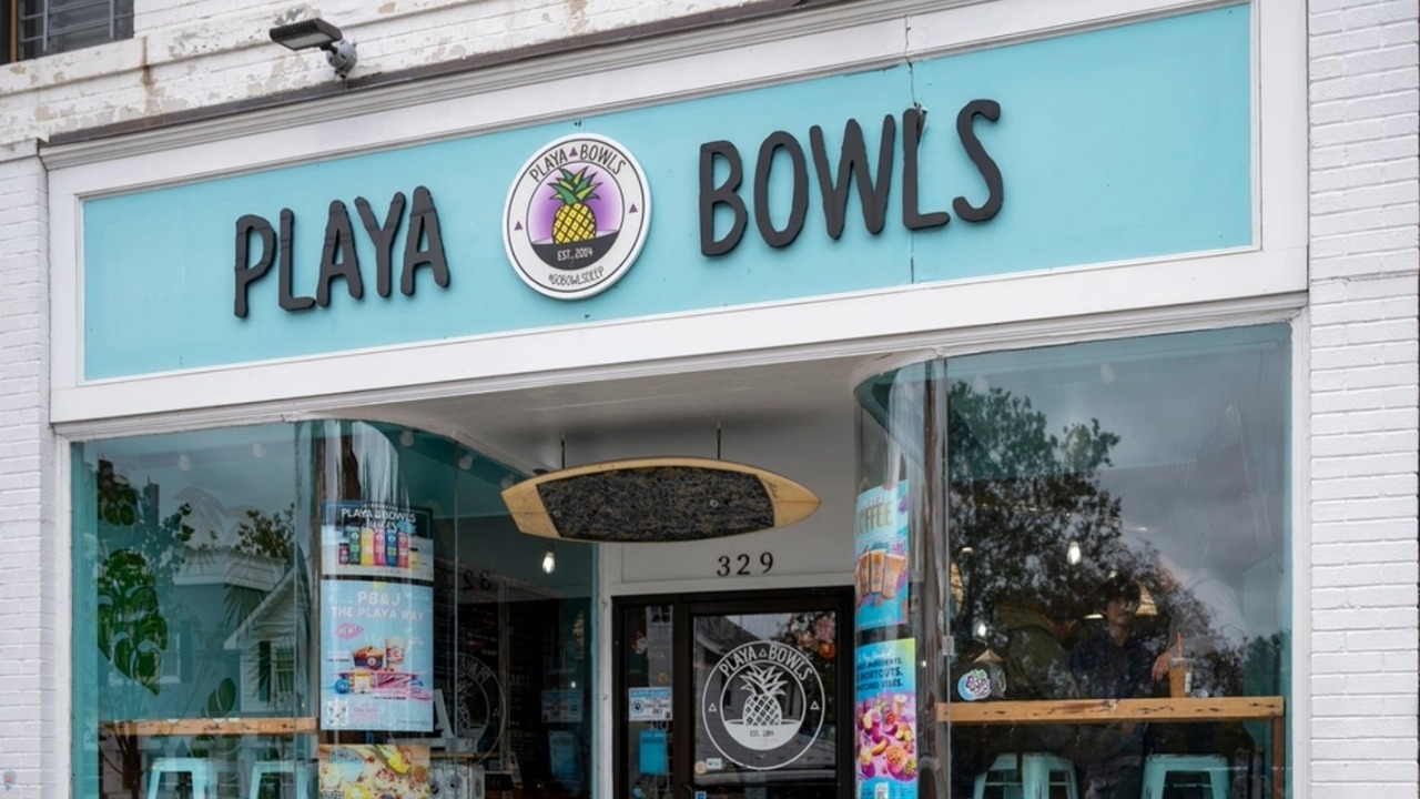 Exterior of a Playa Bowls restaurant, a national açaí bowl and smoothie chain expanding into Tampa's Channel District.