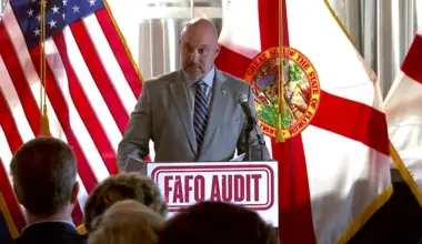 Florida CFO Blaise Ingoglia speaks at a lectern in Jacksonville Beach.
