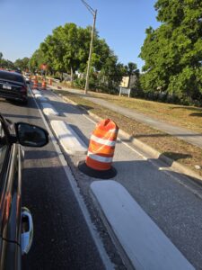 a protected bike lane on a street