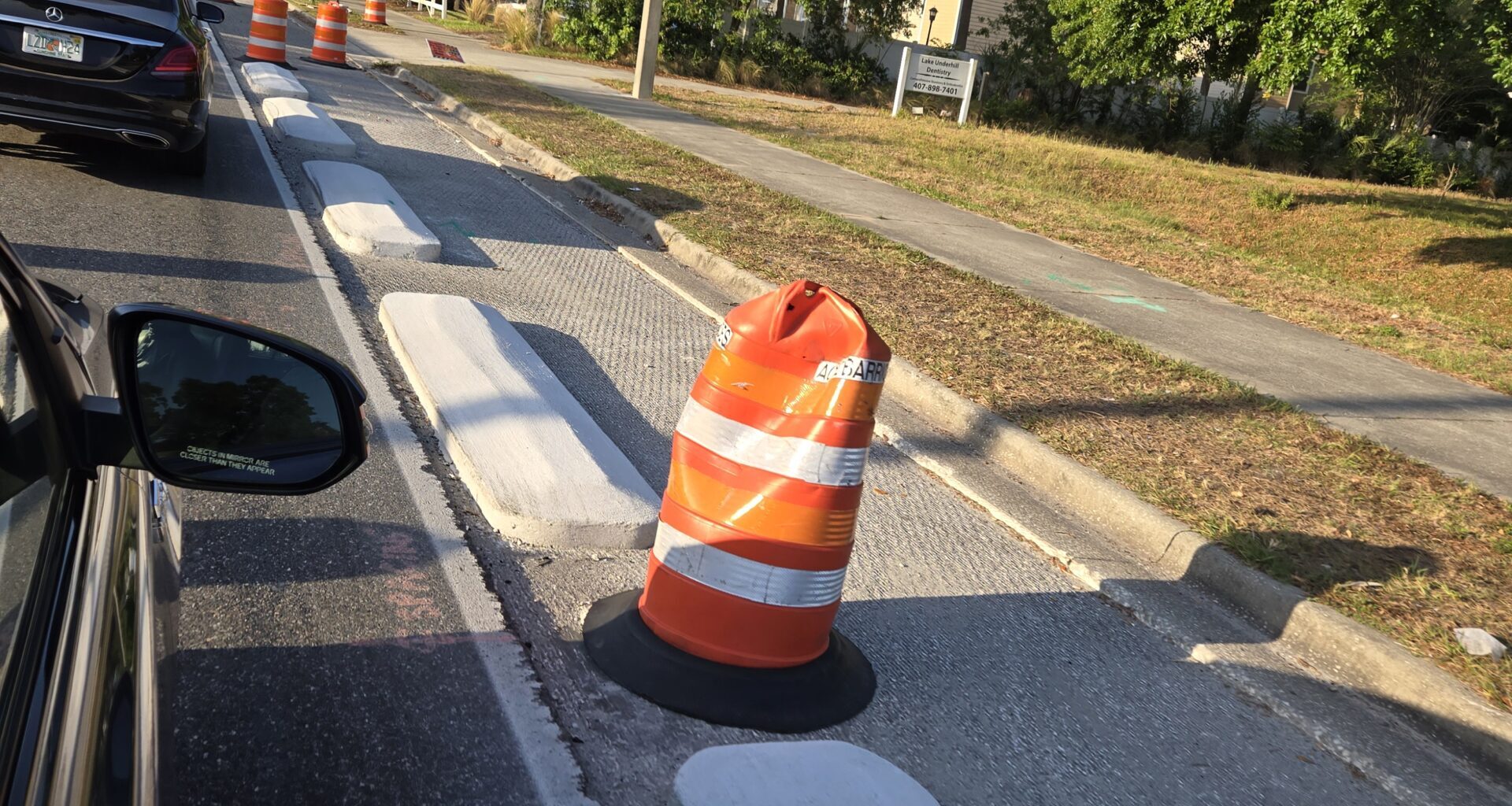 a protected bike lane on a street