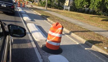 a protected bike lane on a street