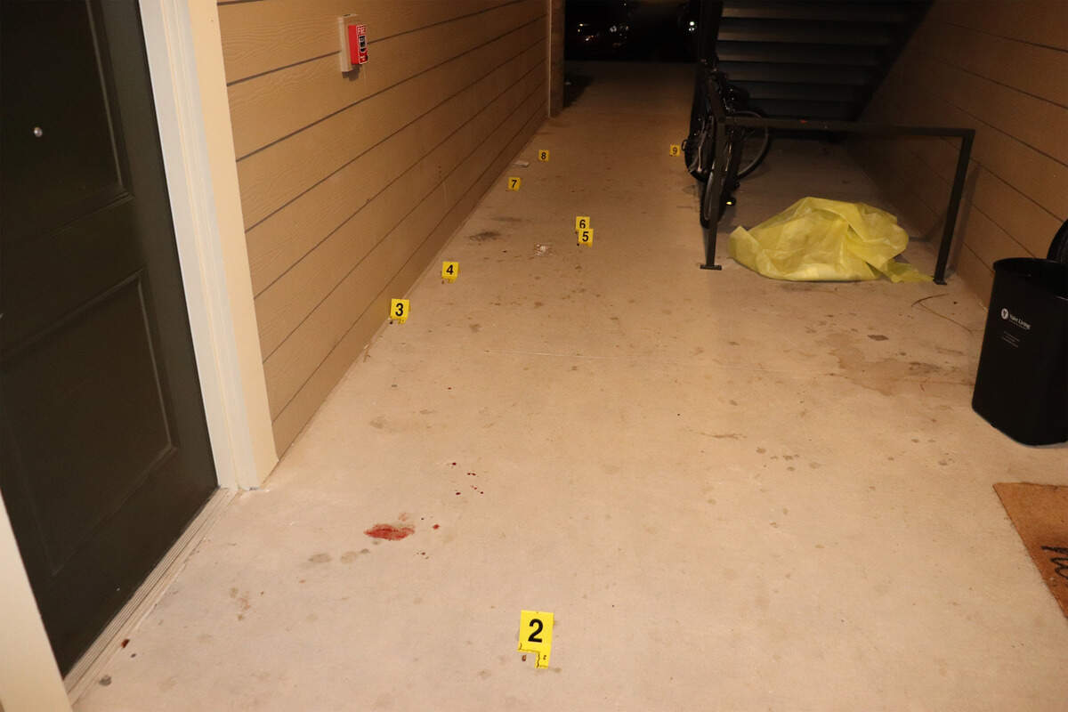 Police found Alea Bates of Tallahassee, Florida, lying on the ground in the breezeway of an apartment building the night she was shot seven times after making a food delivery in December 2019. Crime scene photos documented blood and bullet casings from the assault.