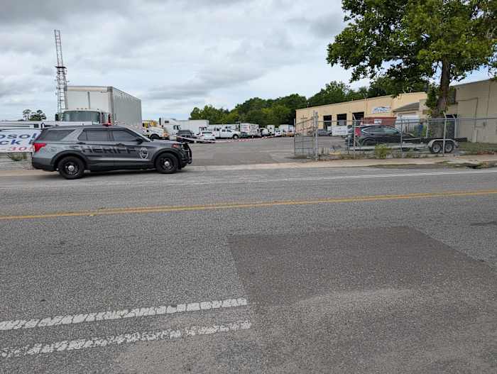 Man killed after being trapped between semi-cab truck, power lift system in Mixon Town: JSO