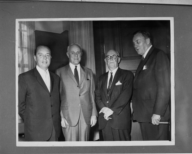  Formal completion of the purchase of the Orlando Sentinel and the Star took place Aug. 31, 1965, in the office of J. Howard Wood, president of the Tribune Co. and publisher of the Chicago Tribune. Pictured are (from left) F. A. Nichols, treasurer and assistant to the president of the Tribune Co., Mr. Wood, President and Publisher F. M. Flynn and Martin Andersen, president of Orlando Daily Newspapers, Inc. (Orlando Sentinel File)