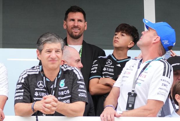 Lionel Messi watches the Miami Formula One Grand Prix auto race