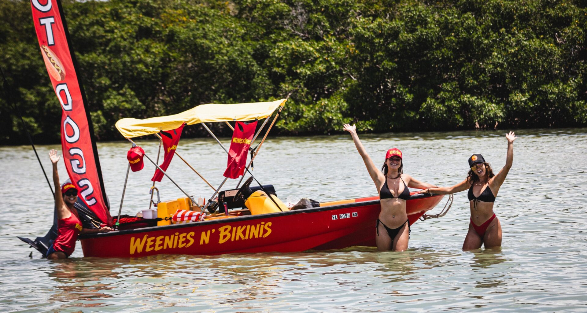 Weenis 'N Bikinis brings a 'Bay Watch' meets Hulk Hogan type vibe to Tampa Bay's food boat scene
