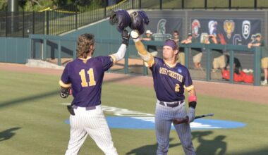 West Chester's Carter Rust (left) celebrates his fifth inning homer with teammate Caleb Strawhecker in Cary, N.C. against Tampa on Thursday.