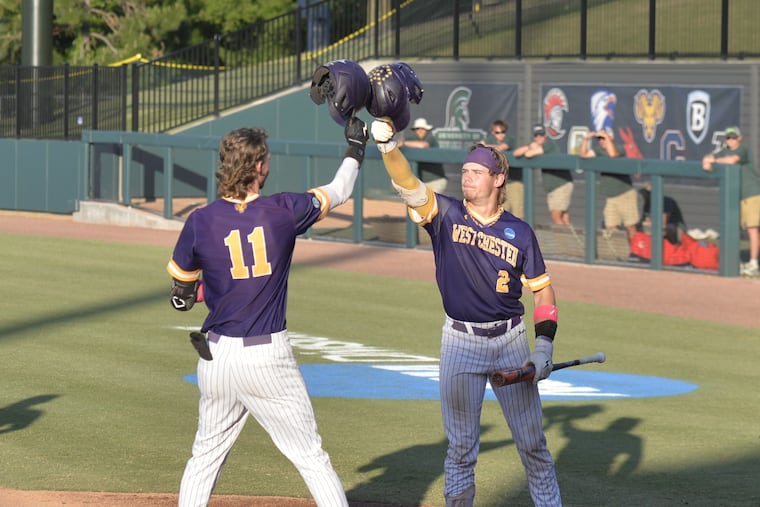 West Chester's Carter Rust (left) celebrates his fifth inning homer with teammate Caleb Strawhecker in Cary, N.C. against Tampa on Thursday.