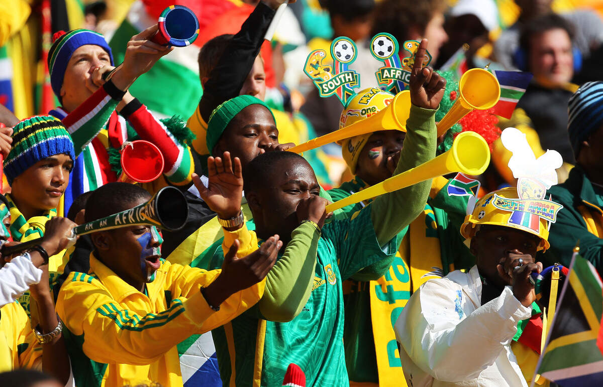 JOHANNESBURG, SOUTH AFRICA - JUNE 11: South Africa fans blow Vuvuzela's ahead of the Opening Ceremony of the 2010 FIFA World Cup South Africa Group A match between South Africa and Mexico at Soccer City Stadium on June 11, 2010 in Johannesburg, South Africa. (Photo by Clive Rose/Getty Images)