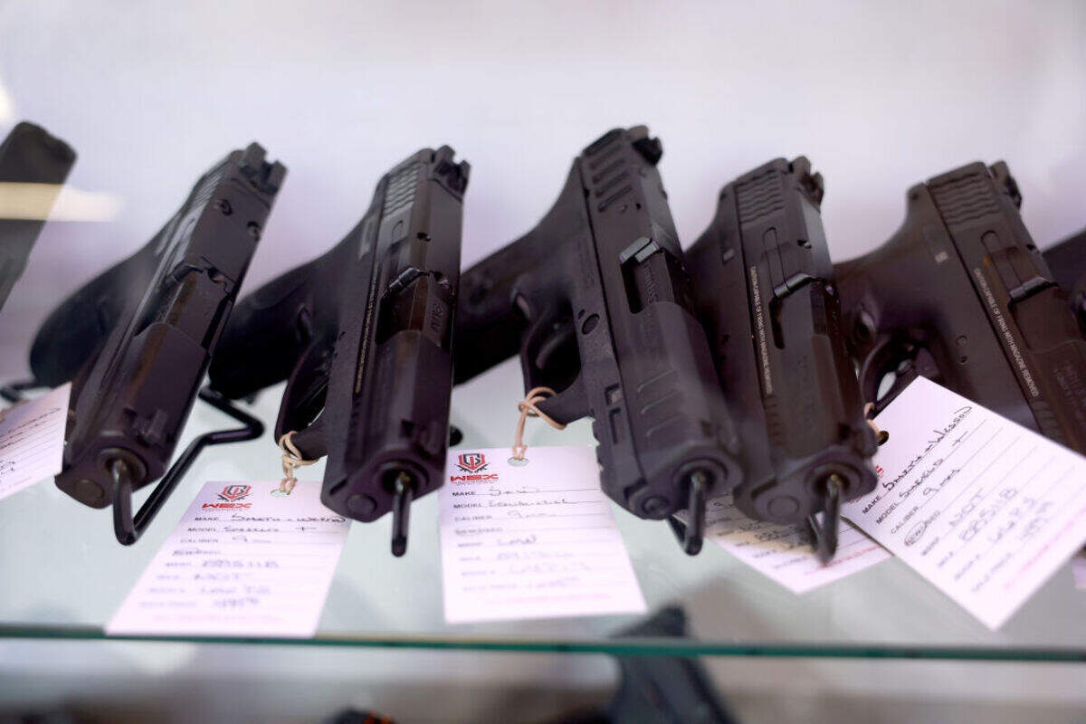 Handguns for sale at a gun shop in Delray Beach, Florida. Florida law allows eligible residents to carry a concealed firearm and to openly carry a firearm without a state-issued license.