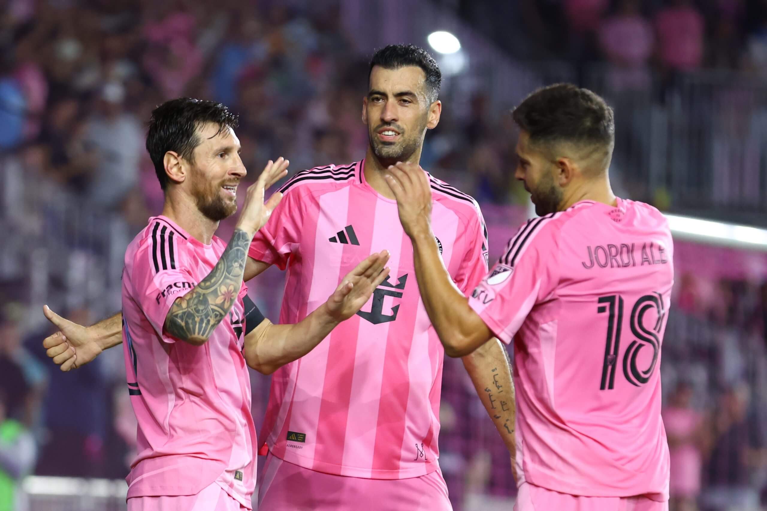 Lionel Messi with Sergio Busquets and Jordi Alba