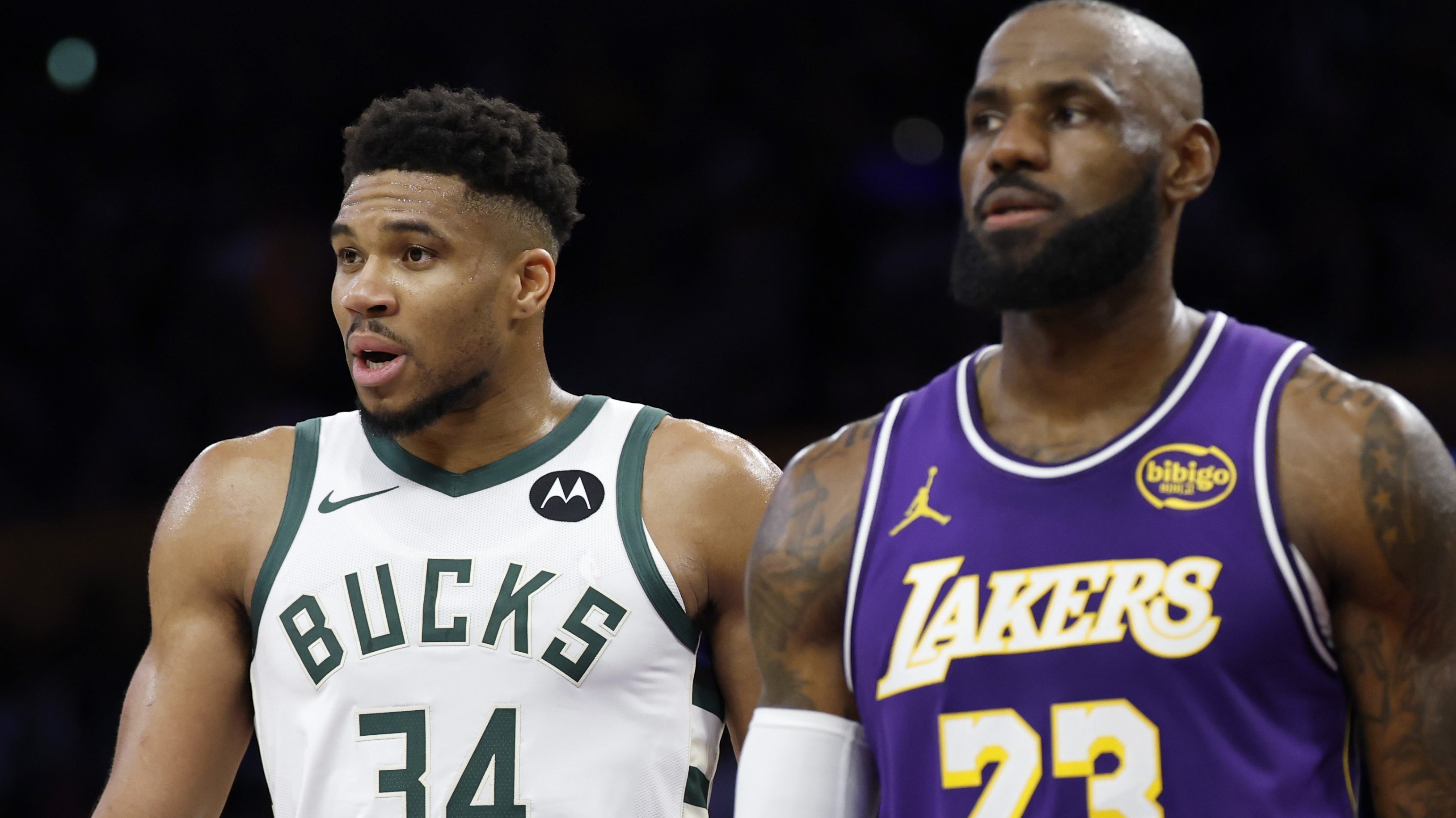 Giannis Antetokounmpo #34 of the Milwaukee Bucks follows LeBron James #23 of the Los Angeles Lakers