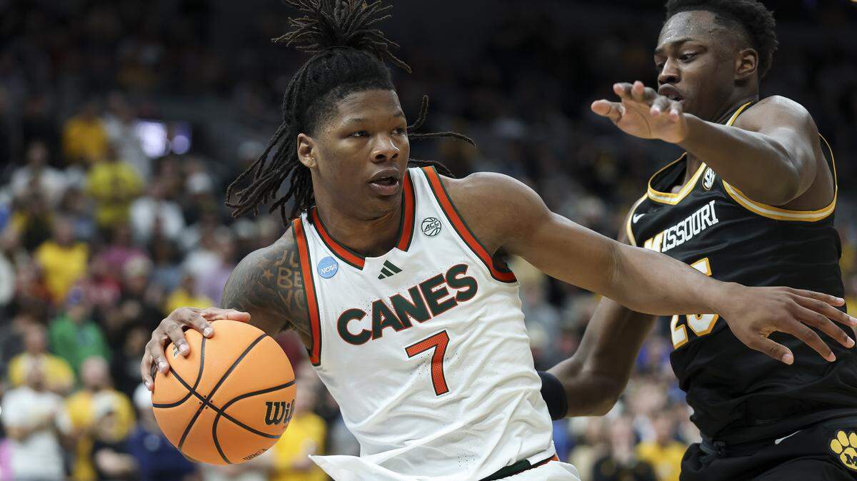ST LOUIS, MISSOURI - MARCH 20: Shelton Henderson #7 of the Miami (FL) Hurricanes drives the ball against Mark Mitchell #25 of the Missouri Tigers during the second half in the first round of the 2026 NCAA Men's Basketball Tournament at Enterprise Center on March 20, 2026 in St Louis, Missouri. (Photo by Jamie Squire/Getty Images) ST LOUIS, MISSOURI - MARCH 20: Shelton Henderson #7 of the Miami (FL) Hurricanes drives the ball against Mark Mitchell #25 of the Missouri Tigers during the second half in the first round of the 2026 NCAA Men's Basketball Tournament at Enterprise Center on March 20, 2026 in St Louis, Missouri. (Photo by Jamie Squire/Getty Images)