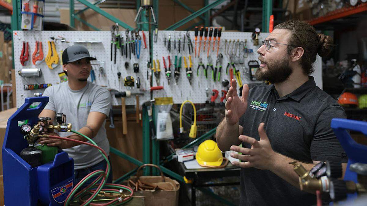 Instructor Bryan Vela (right) teaches Marcos Cofre about brazing heating, ventilation and air conditioning systems at the Level5HVAC construction trade school on May 9, 2026, in Homestead, Florida. Vocational trade schools have seen an uptick in interest as AI threatens the traditional job market. Instructor Bryan Vela (right) teaches Marcos Cofre about brazing heating, ventilation and air conditioning systems at the Level5HVAC construction trade school on May 9, 2026, in Homestead, Florida. Vocational trade schools have seen an uptick in interest as AI threatens the traditional job market.