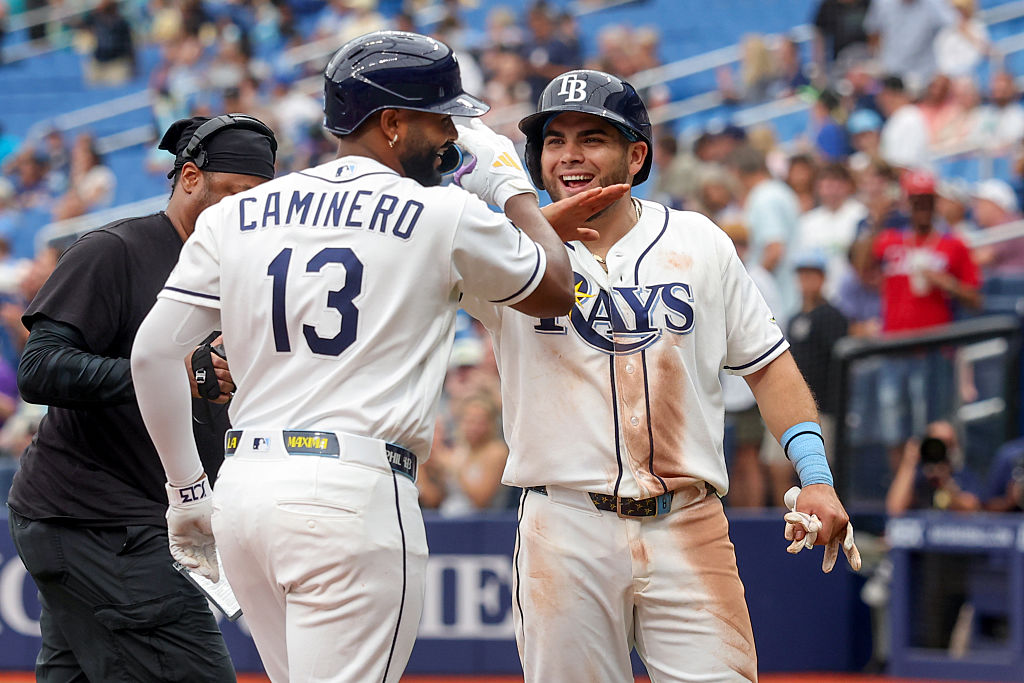 ST. PETERSBURG, FL - JUNE 25: Junior Caminero #13 of the Tampa Bay Rays celebrates his home run against the Kansas City Royals with Jonathan Aranda #8 during the eighth inning of a baseball game at Tropicana Field on June 25, 2026 in St. Petersburg, Florida. (Photo by Mike Carlson/Getty Images)