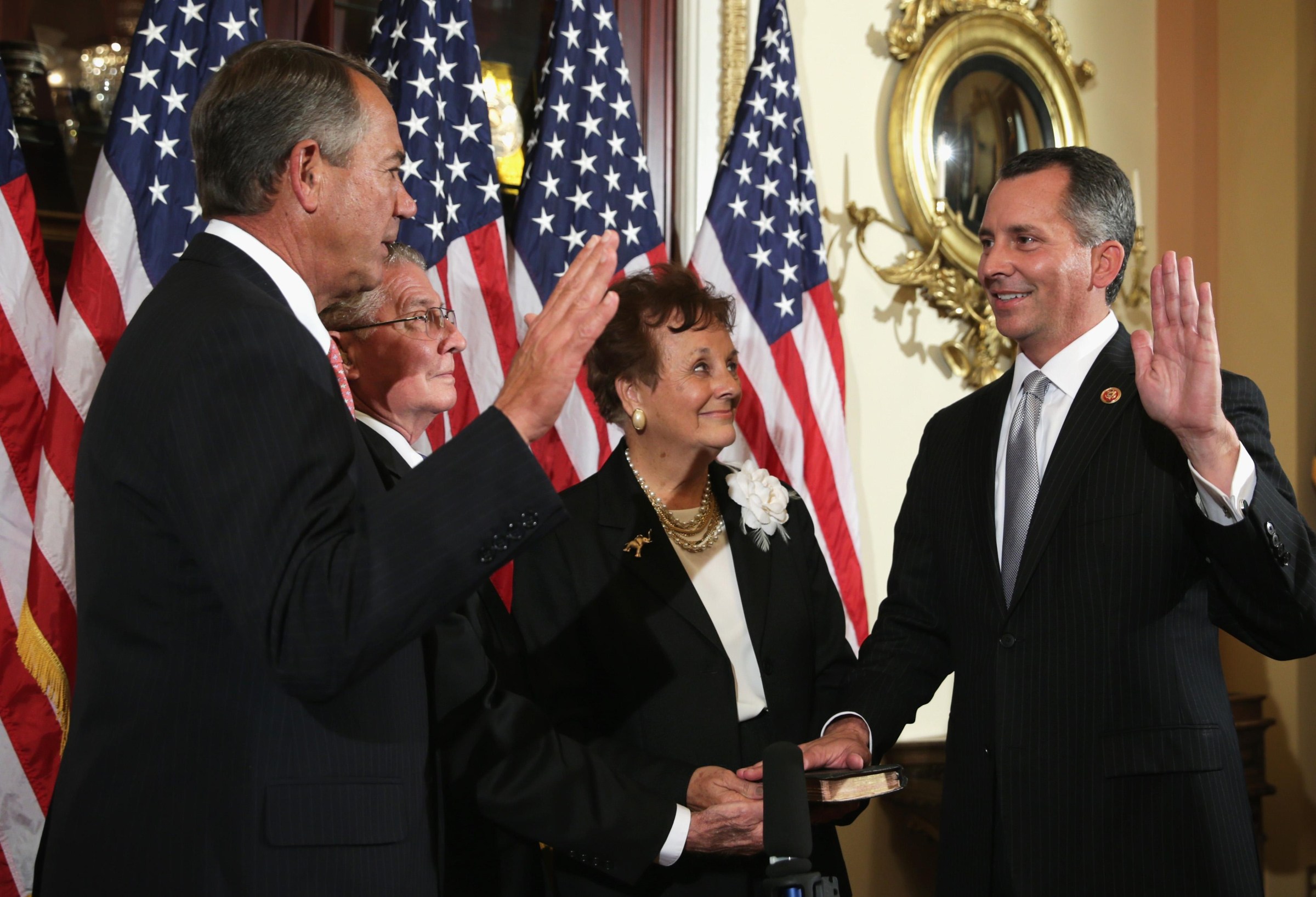 Then-Speaker of the House John Boehner swears in Rep. David Jolly in 2014
