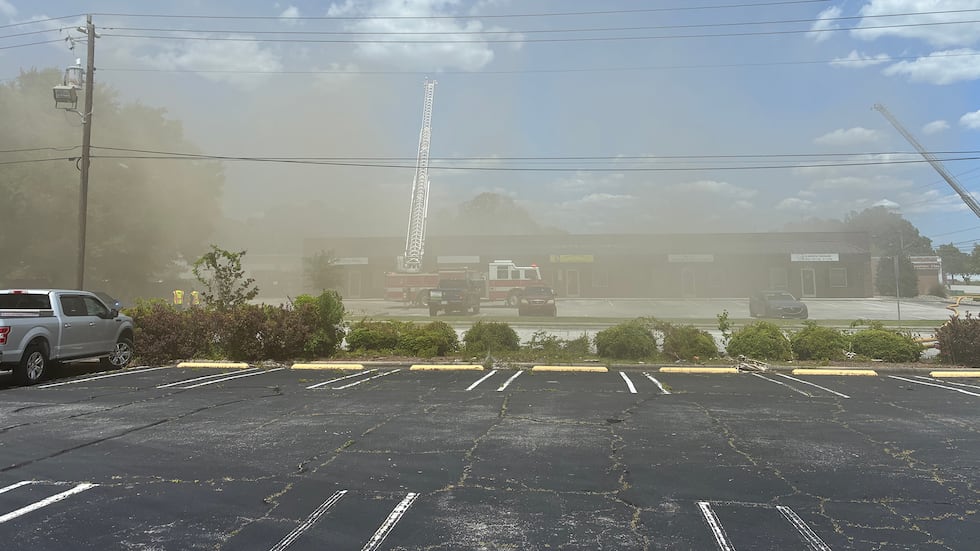 The fire is in a warehouse behind Furniture Plus on North Marine Boulevard.