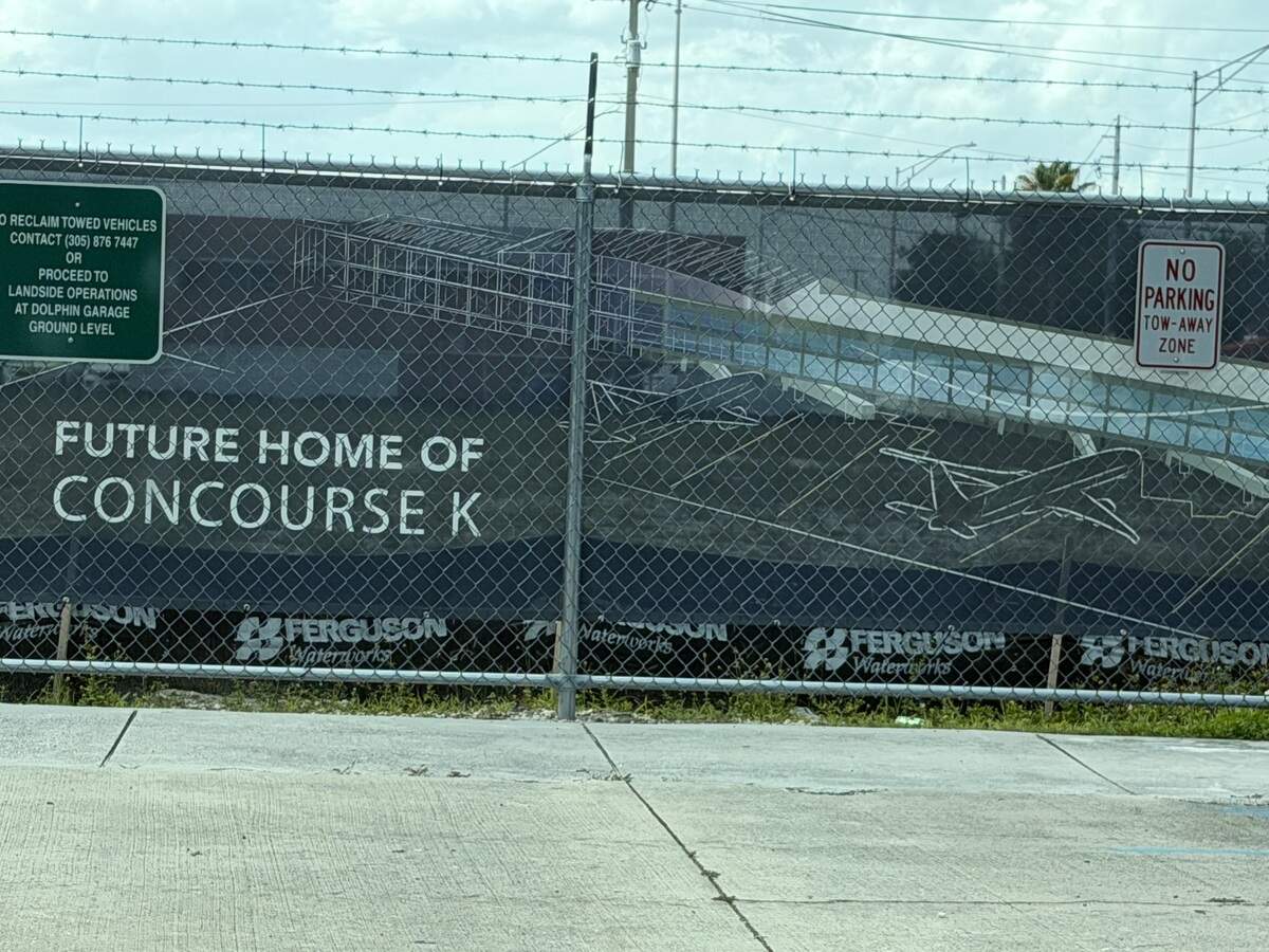An airport sign indicating the future home of Concourse K.