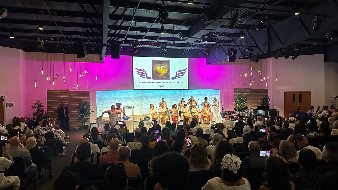Hundreds fill the room at the Spirit of Joy Church in Orlando Thursday night to reflect and honor the 49 lives that were lost 10 years ago. (Spectrum News)