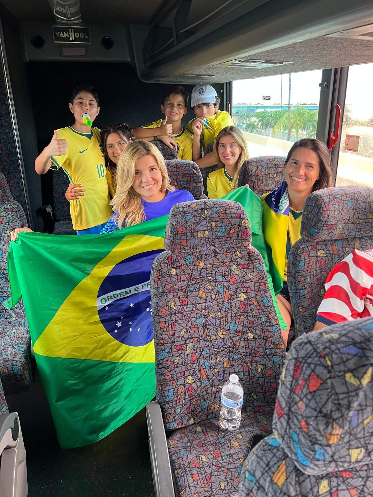 Brazil fans Adriana De Arce and her sister, Joana Souza, take the free shuttle to the Brazil vs. Scotland match.