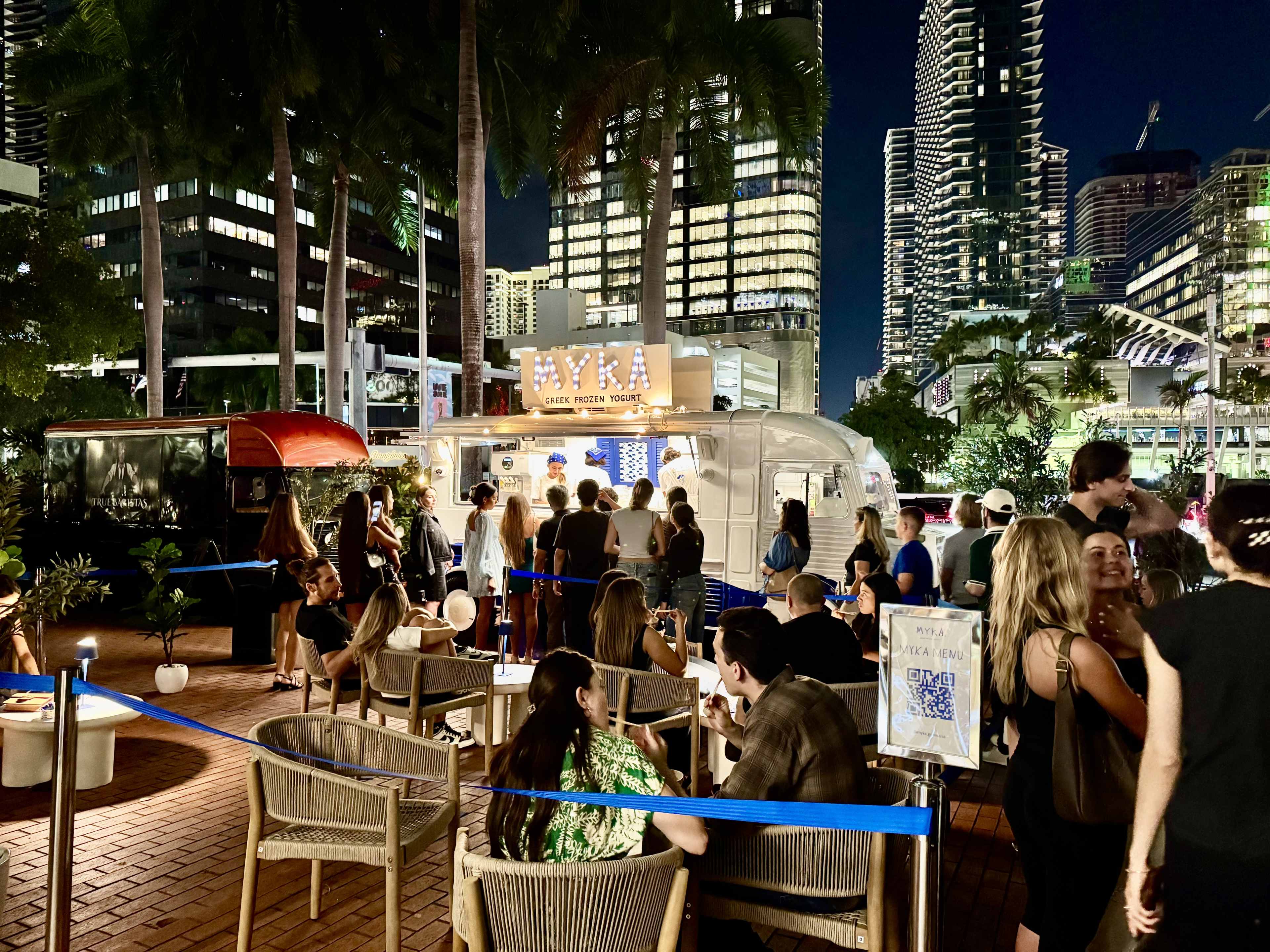 Giant crowd of people in front of Myka's frozen yogurt truck in Brickell.