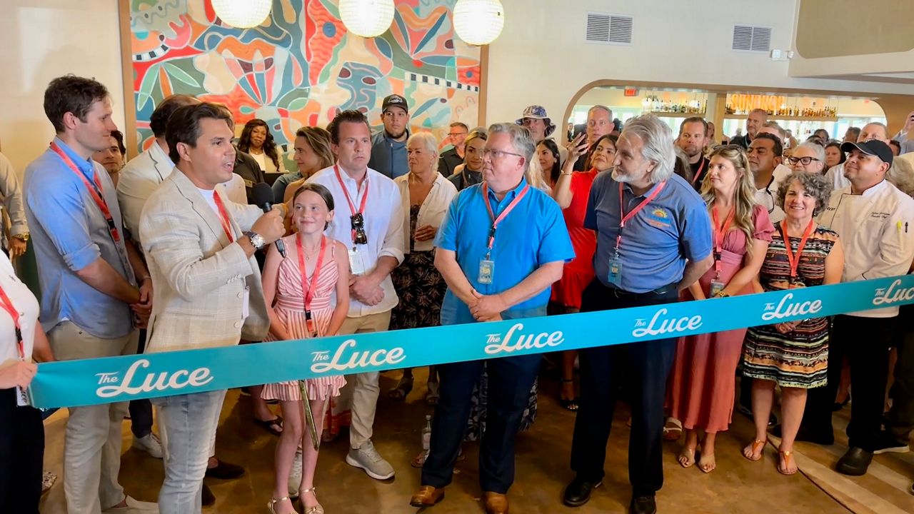 A ribbon cutting for The Luce hotel in St. Pete Beach was held on Wednesday to celebrate the re-opening of the landmark site formerly known as the Postcard Inn. (Spectrum News/Josh Rojas)