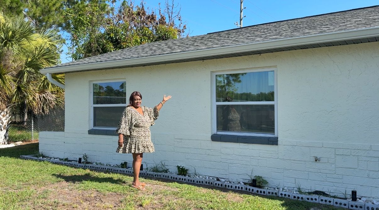 Pine Hills homeowner Marie Conyers Spence received a free roof replacement through Habitat for Humanity’s partnership with Orange County after hurricane damage left her home in need of repairs. (Spectrum News/Bryanna Howard)