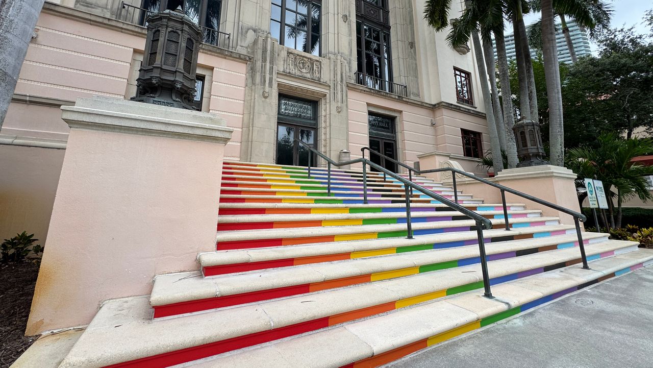 The stairs leading into St. Petersburg's City Hall are seen decorated in the colors of the pride flag. (Spectrum News/Anthony Sande)