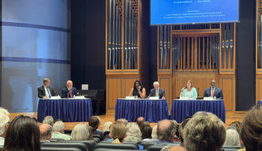 St. Pete Mayoral forum. From left: candidates Kevin Batdorf, Jim Large, Maria Scruggs, Charlie Crist, Brandi Gabbard, and Ken Welch. Photo by Daria Mironova/WMNF.