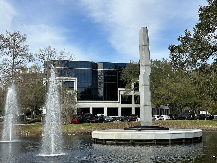 The 68-acre Prominence Office Park includes lakes and a sculpture.