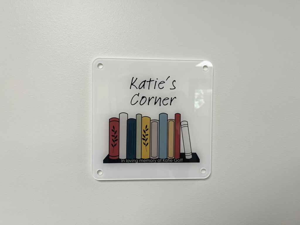A reading nook in the Goff Family Shelter is marked with a sign reading "Katie's Corner," named for a member of the Goff family who died in 2025