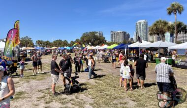 Attendees watch as various performers take the stage during St. Pete Pride's Youth and Family Day.