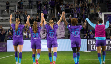 Image of Pride players celebrating with fans.