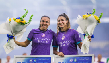 Image of Marta and Angelina being honored before a game.