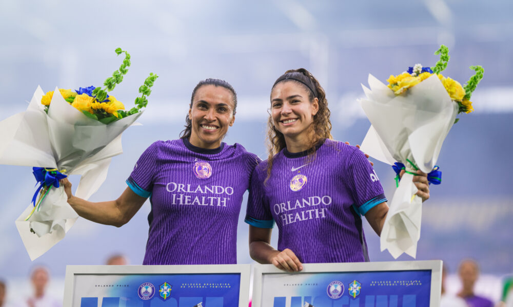 Image of Marta and Angelina being honored before a game.