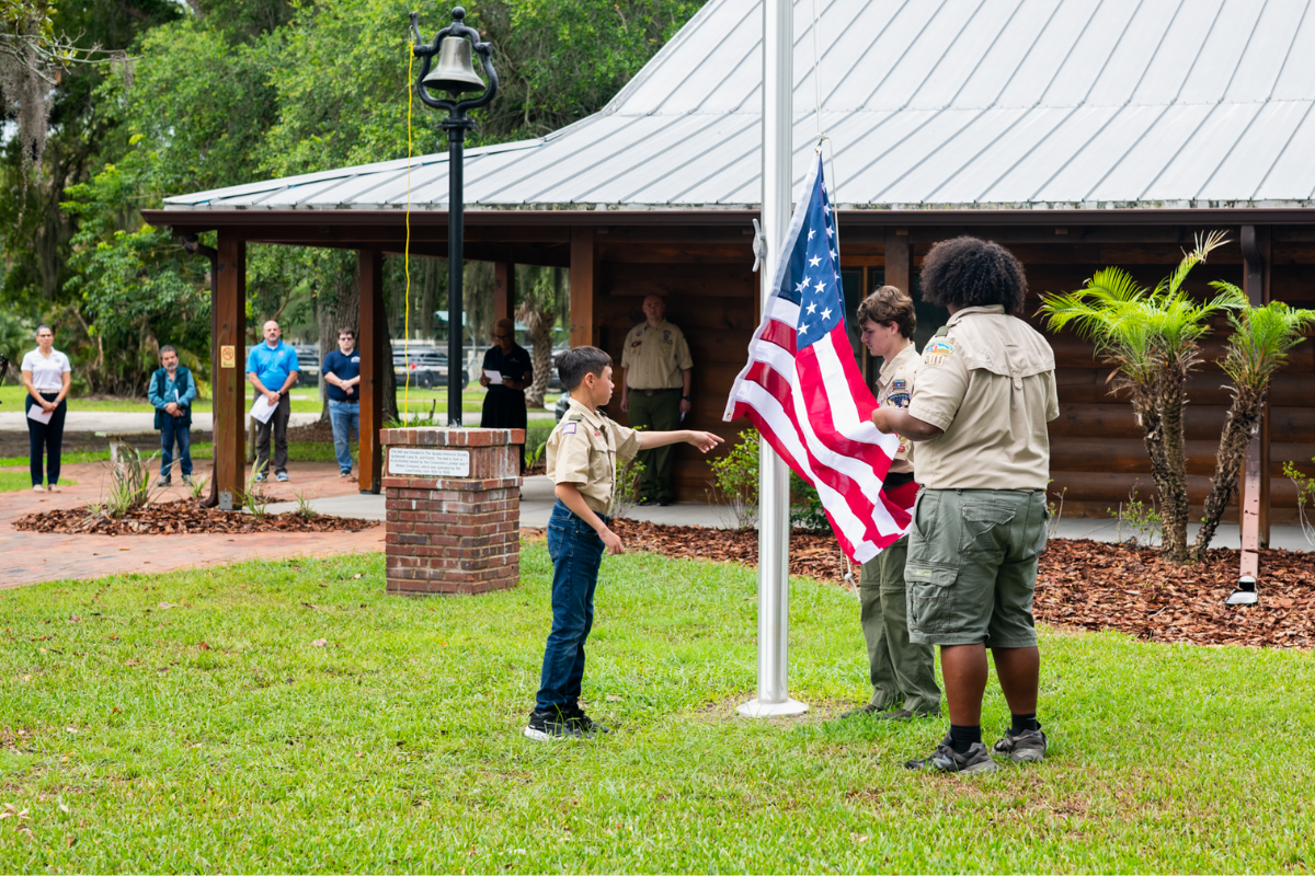 Members of Boy Scout Troop 211 raise the American flag during the dedication of the Apopka Museum's new flagpole May 30. The Eagle Scout project was completed ahead of the City of Apopka and Apopka Historical Society's America’s 250 celebration Wednesday, July 1, which will kick off Apopka's observance of the nation's 250th anniversary. 