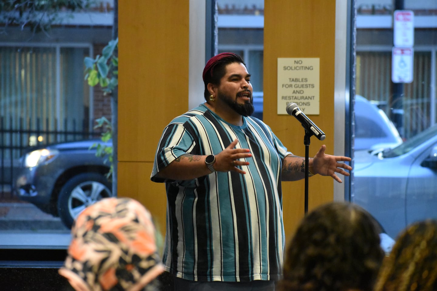 A speaker performs at the Roxbury Poetry Festival.