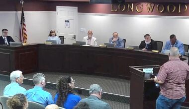 A resident shares his views about a proposed water and wastewater utility rate increase at Monday's Longwood City Commission meeting. (Photo: City of Longwood)