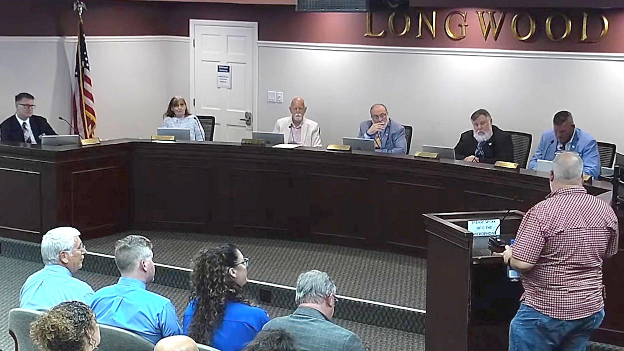 A resident shares his views about a proposed water and wastewater utility rate increase at Monday's Longwood City Commission meeting. (Photo: City of Longwood)