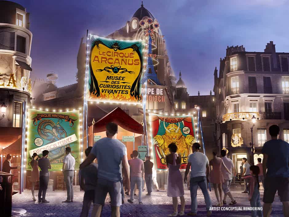 A bustling scene at night depicting a lively street fair with colorful banners for "Le Cirque Arcanus." People are gathered, observing the vibrant displays. The background features ornate buildings and a ferris wheel under a starry sky.